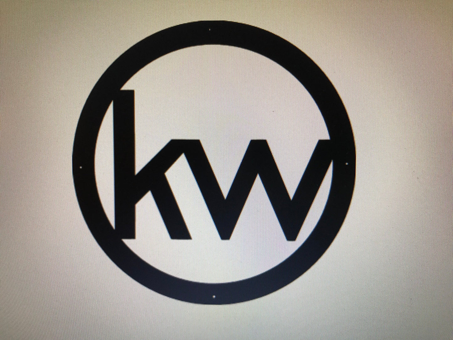Metal monogram in black textured baked on finish